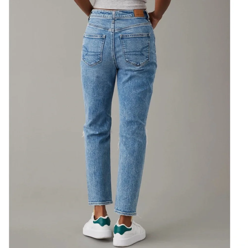 American Eagle Strigid Ripped Mom Jeans in Medium Wash - Picture 10 of 10